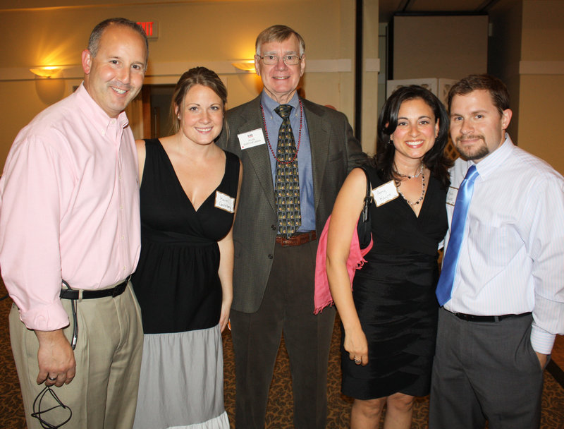 WCSH -6 sports director and party emcee Lee Goldberg, Karen Goldberg, board member Al Barthelman, Amy Kayne and Kevin Kayne, who designed the new logo.