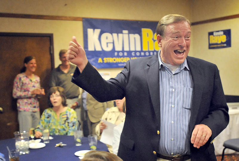 Kevin Raye celebrates Tuesday night in Bangor.