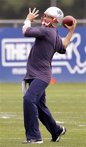 New England Patriots quarterback Tom Brady throws a pass during the first day of NFL football minicamp at the team's facility in Foxborough, Mass., Tuesday, June 12, 2012. (AP Photo/Stephan Savoia)