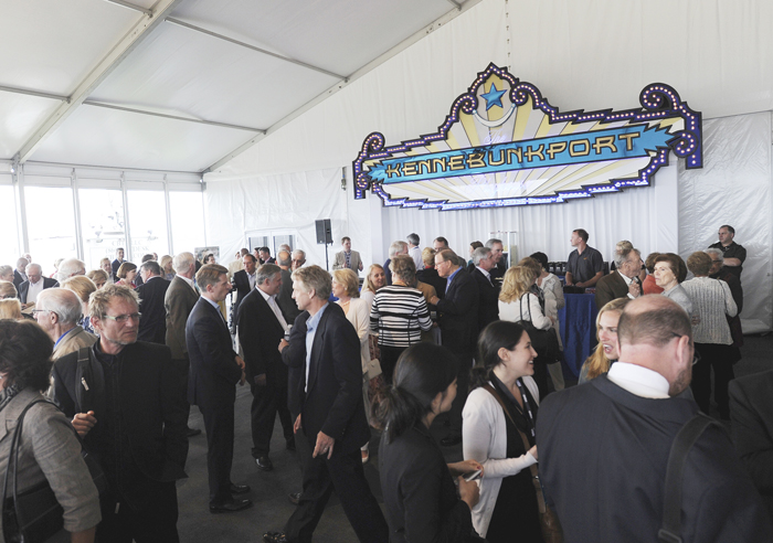 Guests mingle at The Kennebunkport Playhouse, a temporary structure built on the grounds of St. Ann's Church, prior to the special screening of "41" on Tuesday.