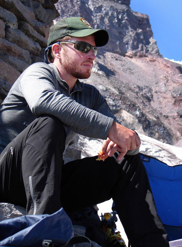 A photo provided by the National Park Service shows climbing ranger Nick Hall on Mount Rainier. Hall was killed Thursday as he was helping to evacuate climbers from a crevasse near the summit.