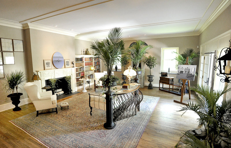 The living room of the Kenneth Roberts Estate has been decorated by Paula Robinson Rossouw of Paula Robinson Design Group and Dan Viehmann of Dan Viehmann Landscaping. The room includes a “rockery wall,” which is basically a rock and water feature built against the wall on one side of the room. On the desk there is an antique phone with the cord cut alongside antique scissors, a nod to the author’s desire for seclusion and his sense of humor.