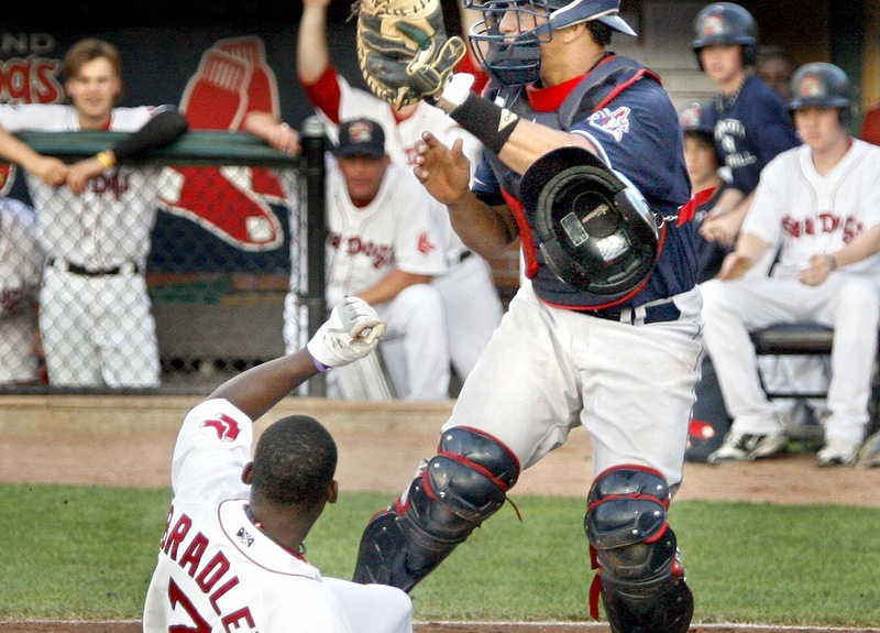 Jackie Bradley Jr. of the Portland Sea Dogs slides safely across the plate Friday night, scoring before New Hampshire catcher Joel Galarraga can apply the tag in the third inning of the Sea Dogs’ 9-3 victory.