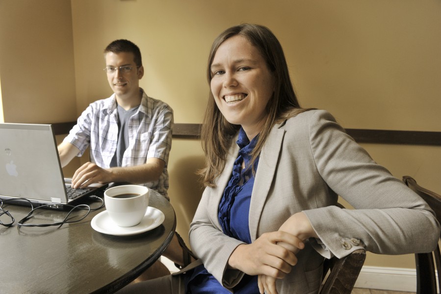 Emma Pope-Welch, a lesbian activist and publisher of a new LGBT news blog that will play a role in organizing Maine's gay community in promoting another referendum on gay marriage this fall. Emma was chatting with a friend, John Dunn, at Bard Coffee Shop in Portland.