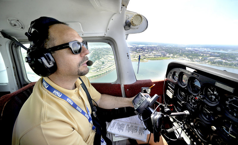 Jim Stenberg with the Bald Eagle Flying Club enjoys flying his club's Cessna 172 around Portland from the jetport.