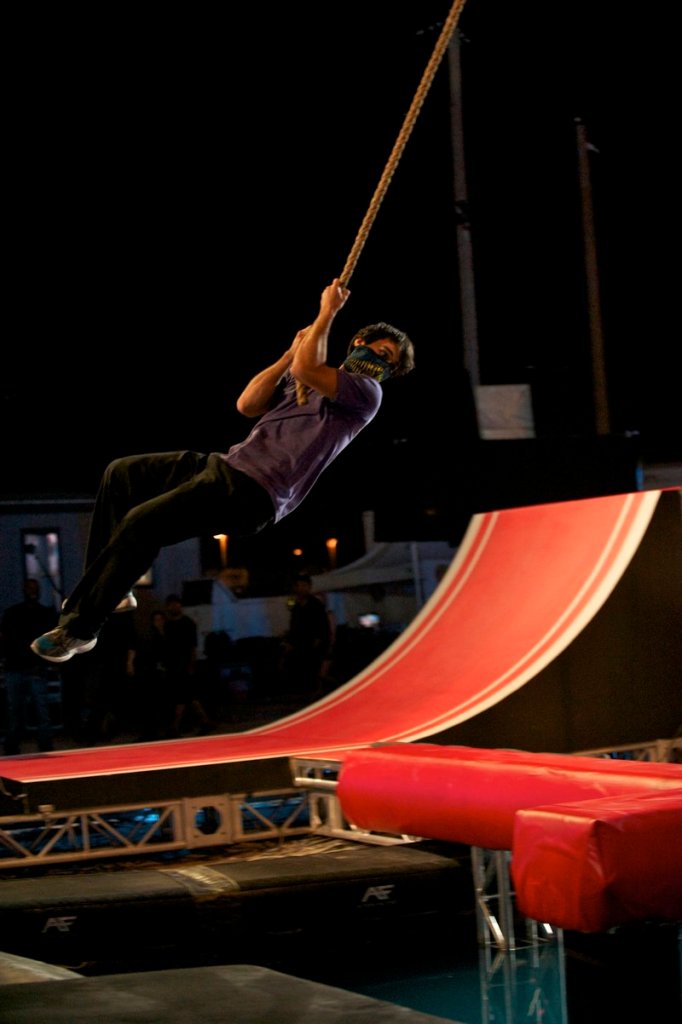 Jesse Villareal attempts to complete an obstacle course during the “American Ninja Warriors” finals competition in Las Vegas, Nev.