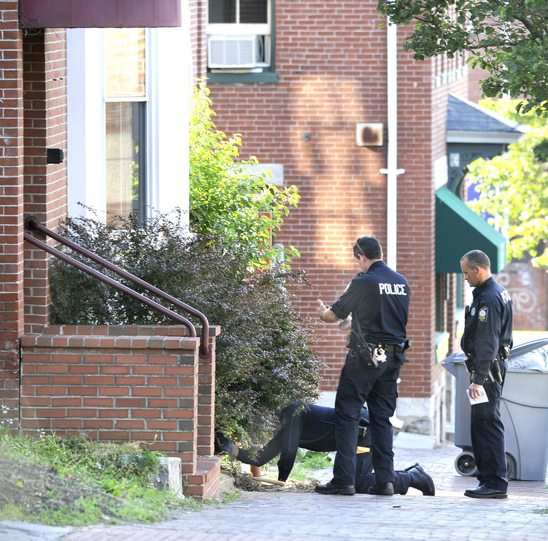 Police look for evidence at 105-107 India St. Matthew Blanchard, the shooting victim, was in the news last month when he crashed his car in Falmouth, killing his passenger.