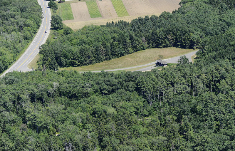 The entrance to Crescent Beach State Park, off Route 77 in Cape Elizabeth, is on land owned by the Sprague Corp., as is part the road leading to the parking lot, about a third of the lot and about a quarter of the beach.