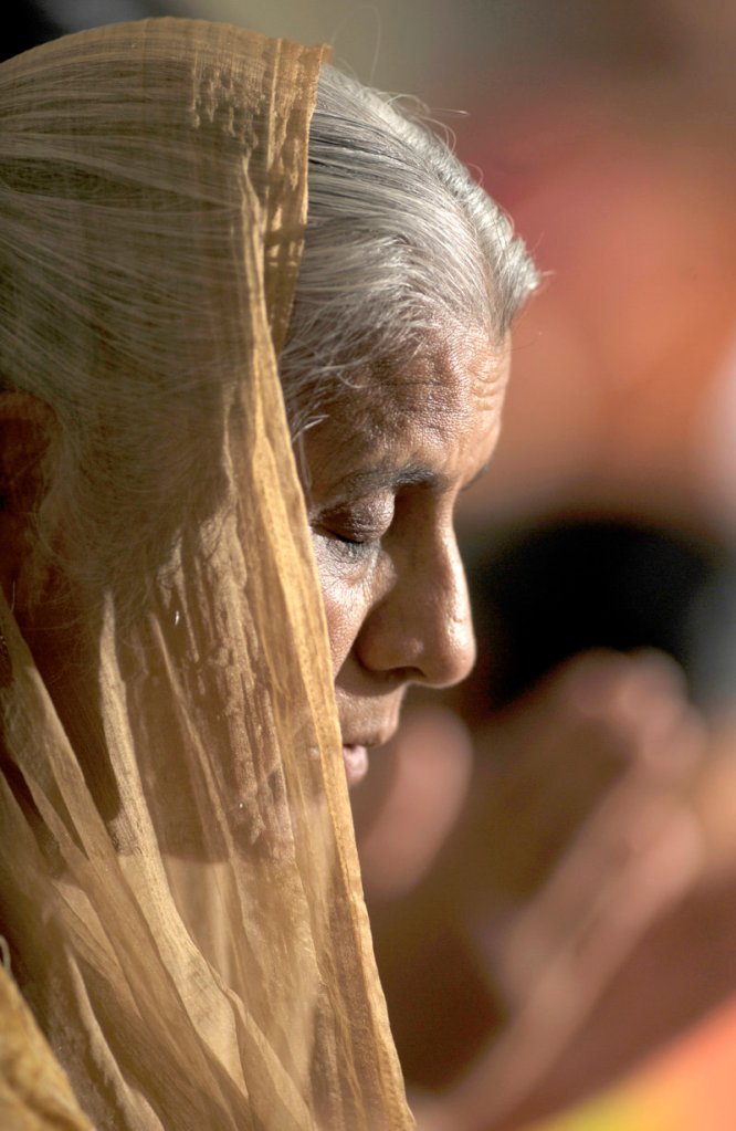 Kamlesh Kaur of South Portland worships at the new Hindu temple on the Scarborough-Buxton town line Thursday.