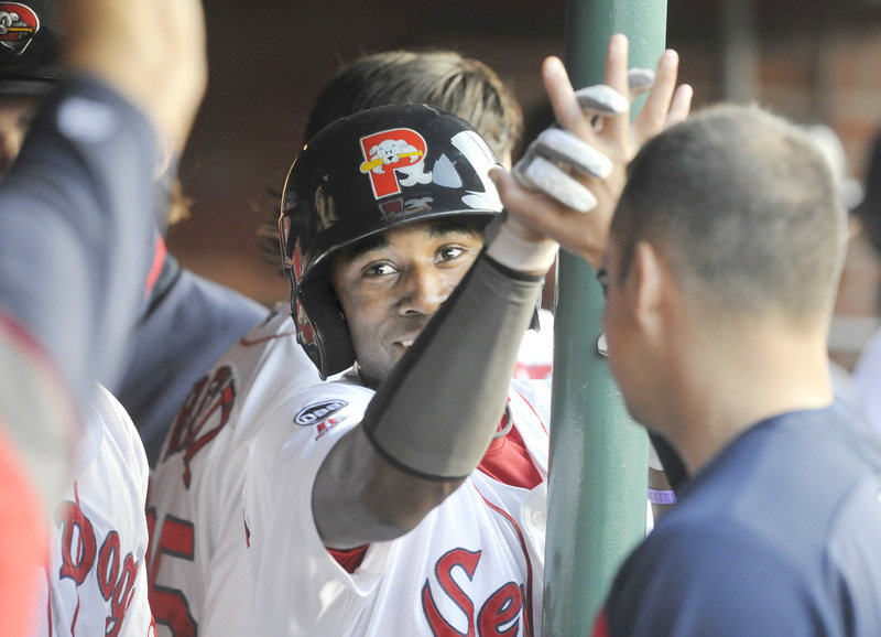 Jackie Bradley Jr. of the Sea Dogs is greeted in the dugout after hitting a first-inning homer Monday night against Trenton at Hadlock Field. It was Bradley’s third homer of the season for Portland, which has won 10 of 13.