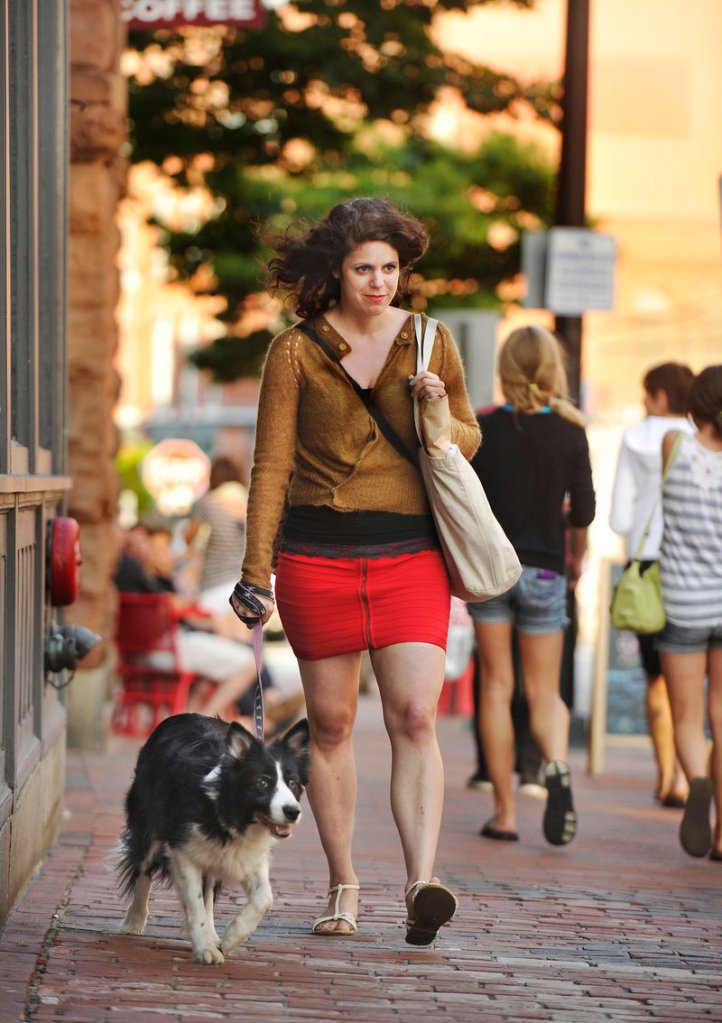 Jessie Lacy gave up her car three years ago. Her daily commute now is a 10-minute walk, often with her dog, from her Grant Street apartment to her job on Exchange Street.