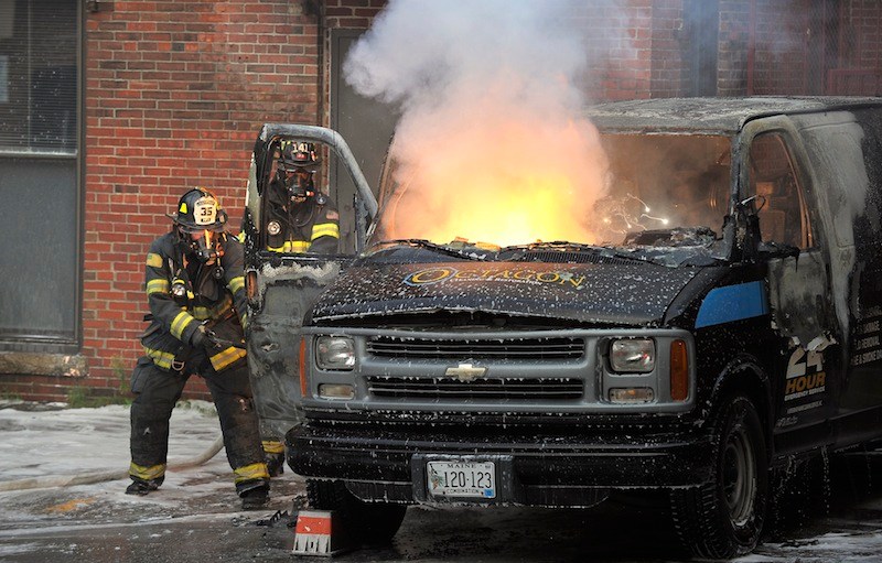 Firefighters responded to a van on fire in a parking lot off Exchange Street on Friday, August 17, 2012.