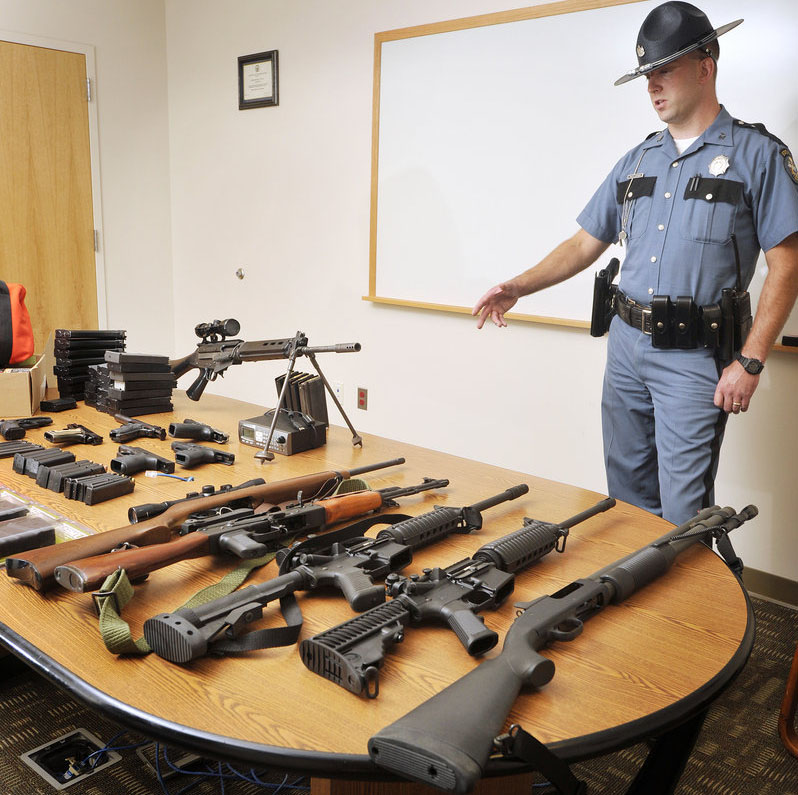 Maine State Police Trooper Philip Alexander seized several guns from Timothy Courtois of Biddeford following his arrest on a criminal speeding charge Sunday on the Maine Turnpike. A search of Courtois’ home turned up additional weapons including a machine gun and boxes of ammunition.