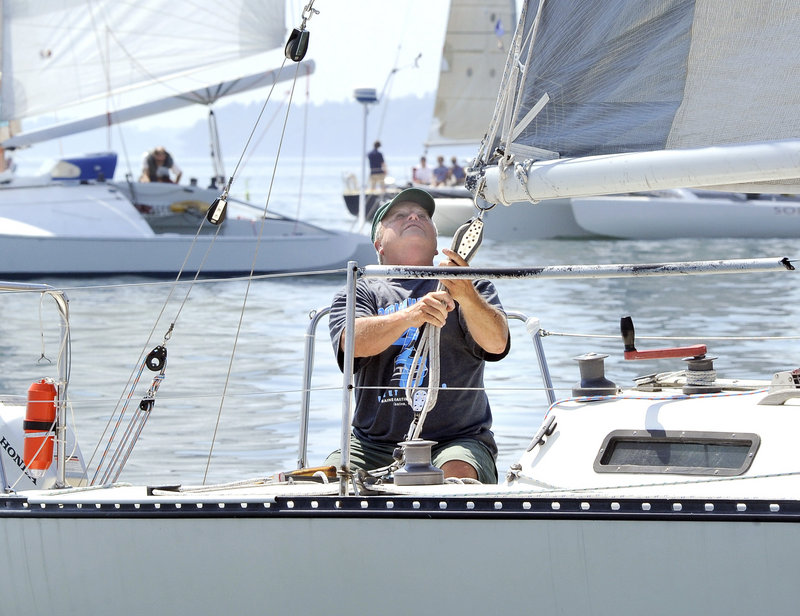 Butch Minson, aboard Beagle, looks for air as he starts the 78th Monhegan Moonlight Regatta on Friday. He was competing in the Double-Handed Racing Class, which goes for 67 miles. The toughest parts of the race come at night.