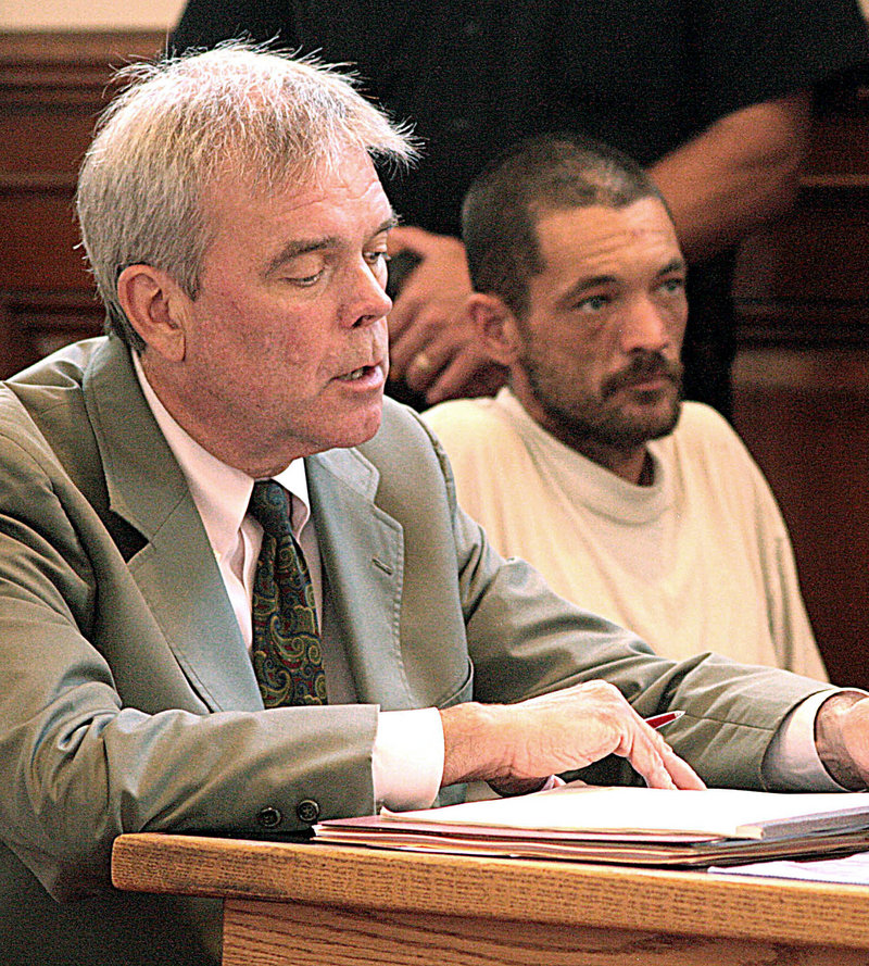 Roger Pion, right, sits in court with his attorney, David Sleigh, in Newport, Vt. on Friday, Aug. 3, 2010. Orleans County sheriffs said Pion was angry over a recent arrest for resisting arrest and marijuana possession when he drove a tractor into the parking lot of the sheriff's department and rolled it multiple times across cruisers and a transport van parked in the lot. No one was injured in Thursdayís incident. (AP Photo/Caledonian Record)