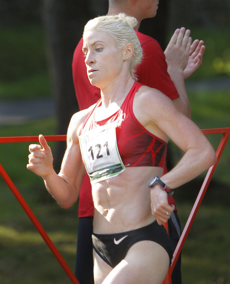 Renee Baillie enters Fort Williams Park, and certainly gets noticed with her bleached blond hair. She was the first American woman finisher.