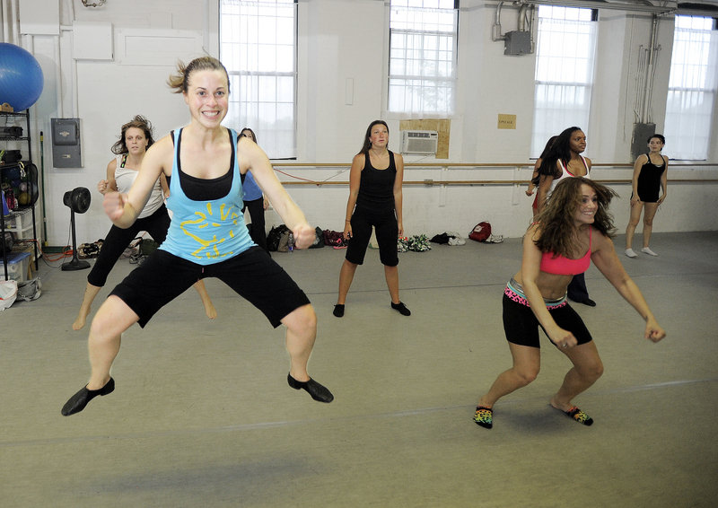 Katie Cyr of Monmouth leaps during the tryout. Cyr is an operating room nurse at Maine General Hospital in Waterville.