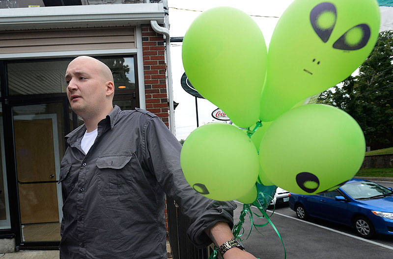 Kevin O'Brien of Bar Harbor shares his experiences with aliens outside the Experiencers Speak conference in Gorham on Saturday.