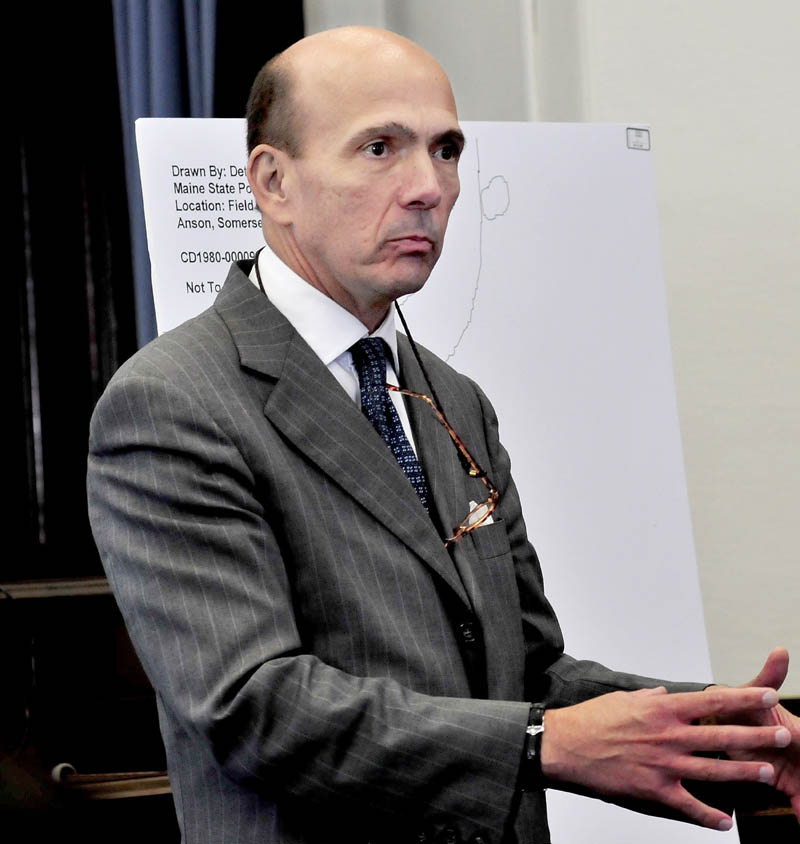 EVIDENCE: Assistant Attorney General Andrew Benson presents evidence to the jury during opening statements in the trial of Jay Mercier in Somerset County Superior Court in Skowhegan on Thursday.