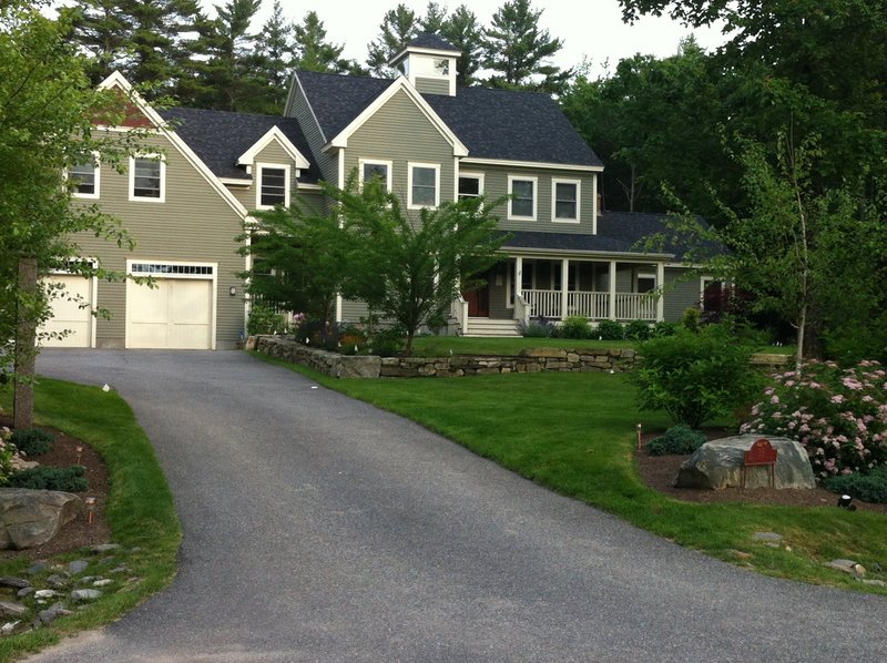 Falmouth police say Barry and Paula Spencer, the owners of this house at 35 Fieldstone Drive, have been charged with furnishing a place for minors to drink alcohol.