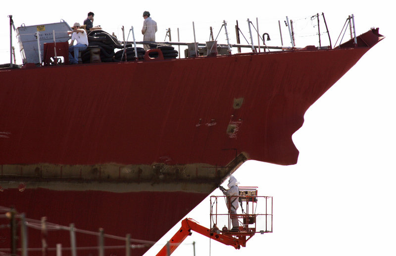 Bath Iron Works employees construct a Navy destroyer in 2005. 