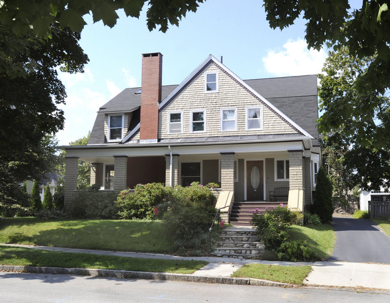 The exterior of Marvin Olsen and Tim Honquest's home, with wide steps leading up to the porch.