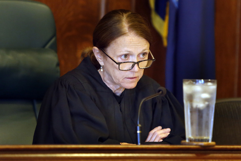 Superior Court Justice Nancy Mills presides Tuesday over the arraignments of Alexis Wright and Mark Strong Sr. at the Cumberland County Courthouse in Portland. “At some point, the defendants’ rights are going to come into play,” Mills said, adding that the case will be expedited.