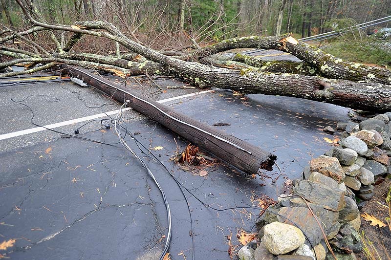 This utility pole was snapped off when a tree fell across Methodist Road during superstorm Sandy. Photo taken on Tuesday, October 30. 2012.