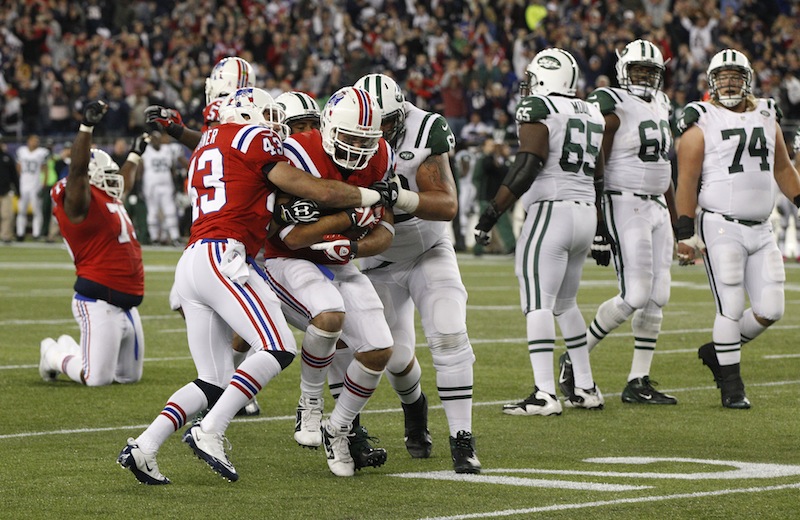 in overtime of an NFL football game in Foxborough, Mass., Sunday, Oct. 21, 2012. The Patriots won 29-26. (AP Photo/Stephan Savoia)