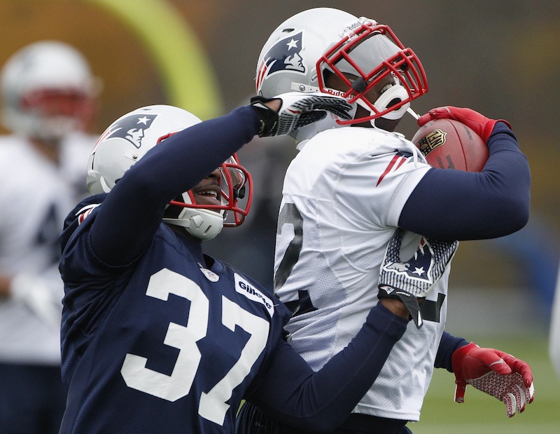 New England Patriots cornerback Alfonzo Dennard (37) tries to pull a ball out of New England Patriots running back Stevan Ridley's grasp during a drill at practice at the NFL football team's facility in Foxborough, Mass., Wednesday, Oct. 24, 2012. (AP Photo/Stephan Savoia) Gillette Stadium