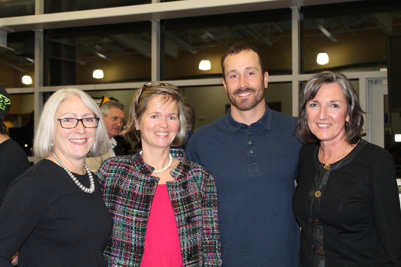 Karen Hakala of Norway Savings Bank, Patricia Weigel, president of Norway Savings Bank, Olympic gold-medal winner Seth Wescott, and Gail McBride of Norway Savings Bank