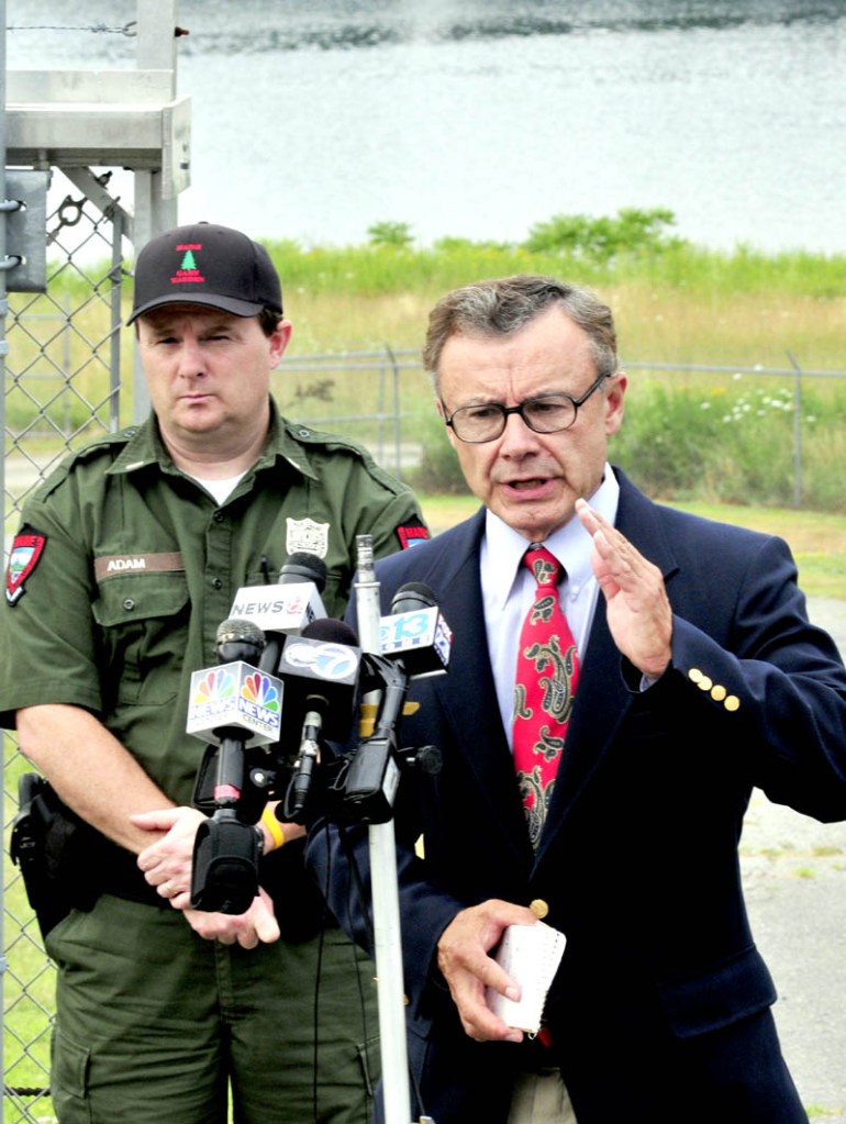 File photo by David Leaming Department of Public Safety Spokesman Steve McCausland, right, gives an update on the extensive search for Ayla Reynolds along the Kennebec River in this file photo from July 17. At left is Lt. Kevin Adam of the Maine Warden Service.