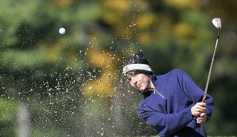 Pete Carley of York chips out of a sand trap on the 15th hole Saturday during the Class B portion of the individual high school golf championships at Vassalboro.