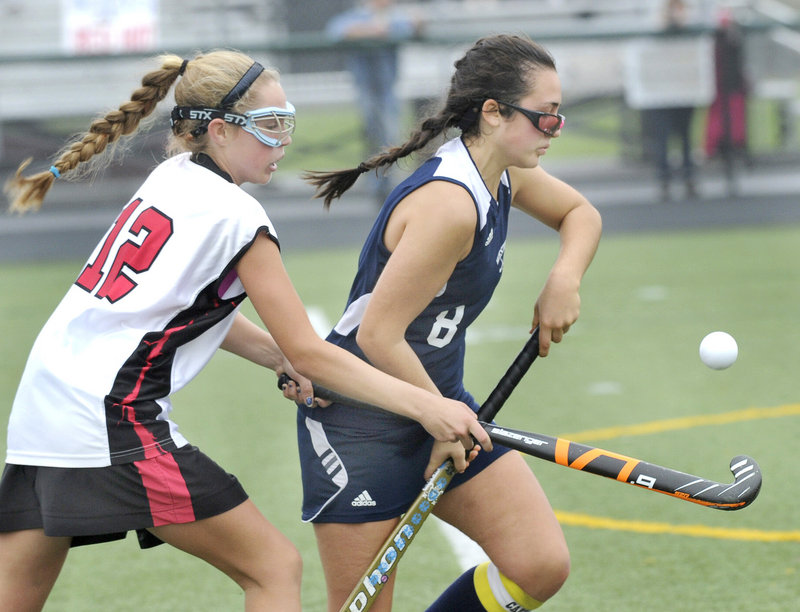 Allison Lemay of Westbrook, right, goes for the ball ahead of Maddie Dobecki of Scarborough during Scarborough’s 3-0 victory in a Western Class A semifinal Saturday.