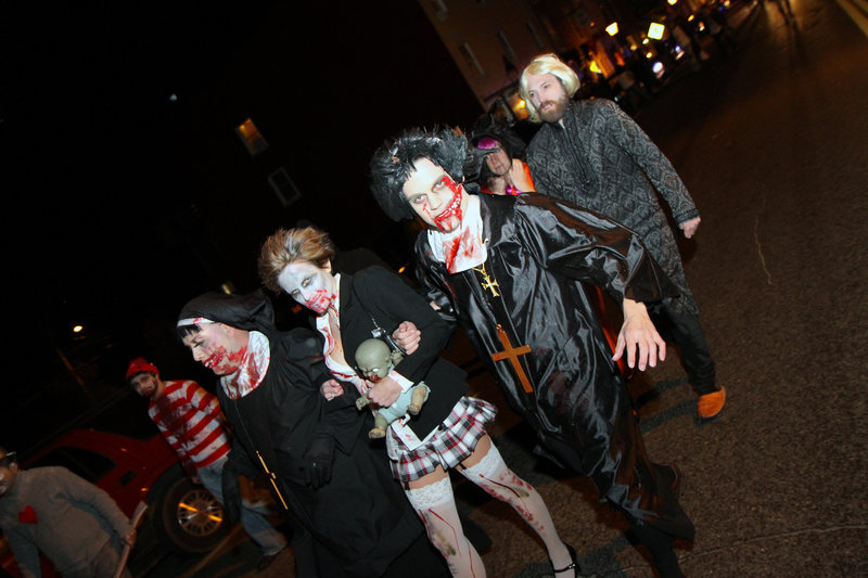 The undead take to the streets during last year's Zombie Crawl.