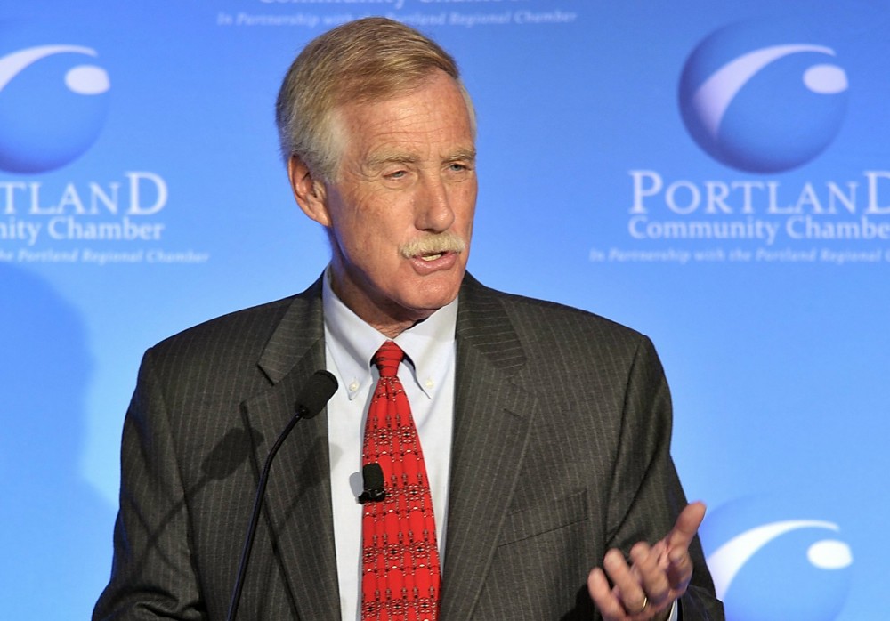 Gordon Chibroski / Staff Photographer: Charlie Hall, moderates as three of the candidates running for the Senate, Cynthia Dill, Angus King and Charlie Summers debate at Eggs and Issues at the Holiday Inn by the Bay in Portland on Tuesday, October 9, 2012. Here, Angus King responds to a question.