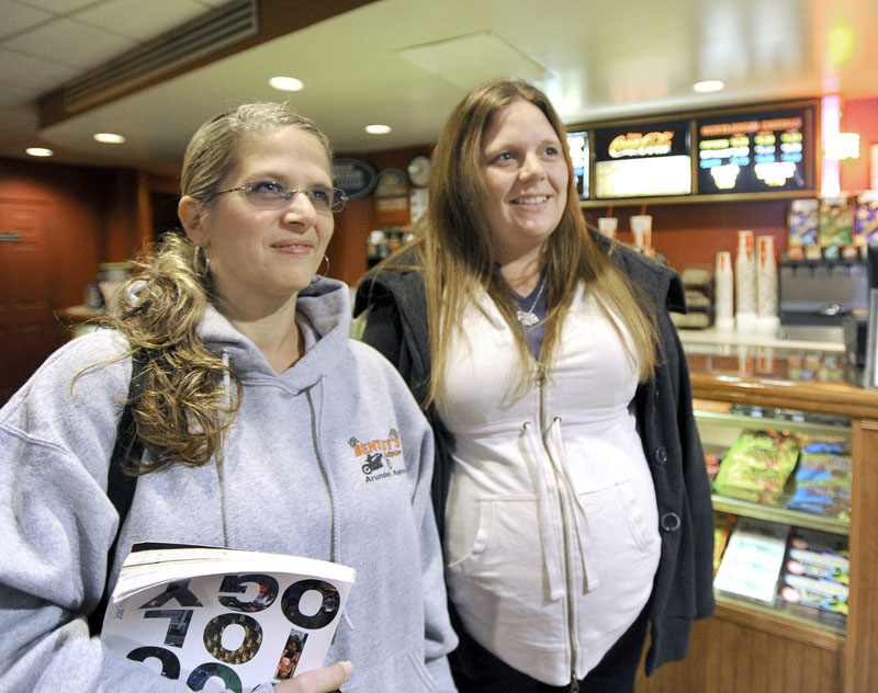 Nicole Doyer from Standish and Julie Scott from Saco were among a few "Twilight" marathon movie goers to view the 10 hour showing at the Nickelodeon Cinemas in Portland on Thursday.