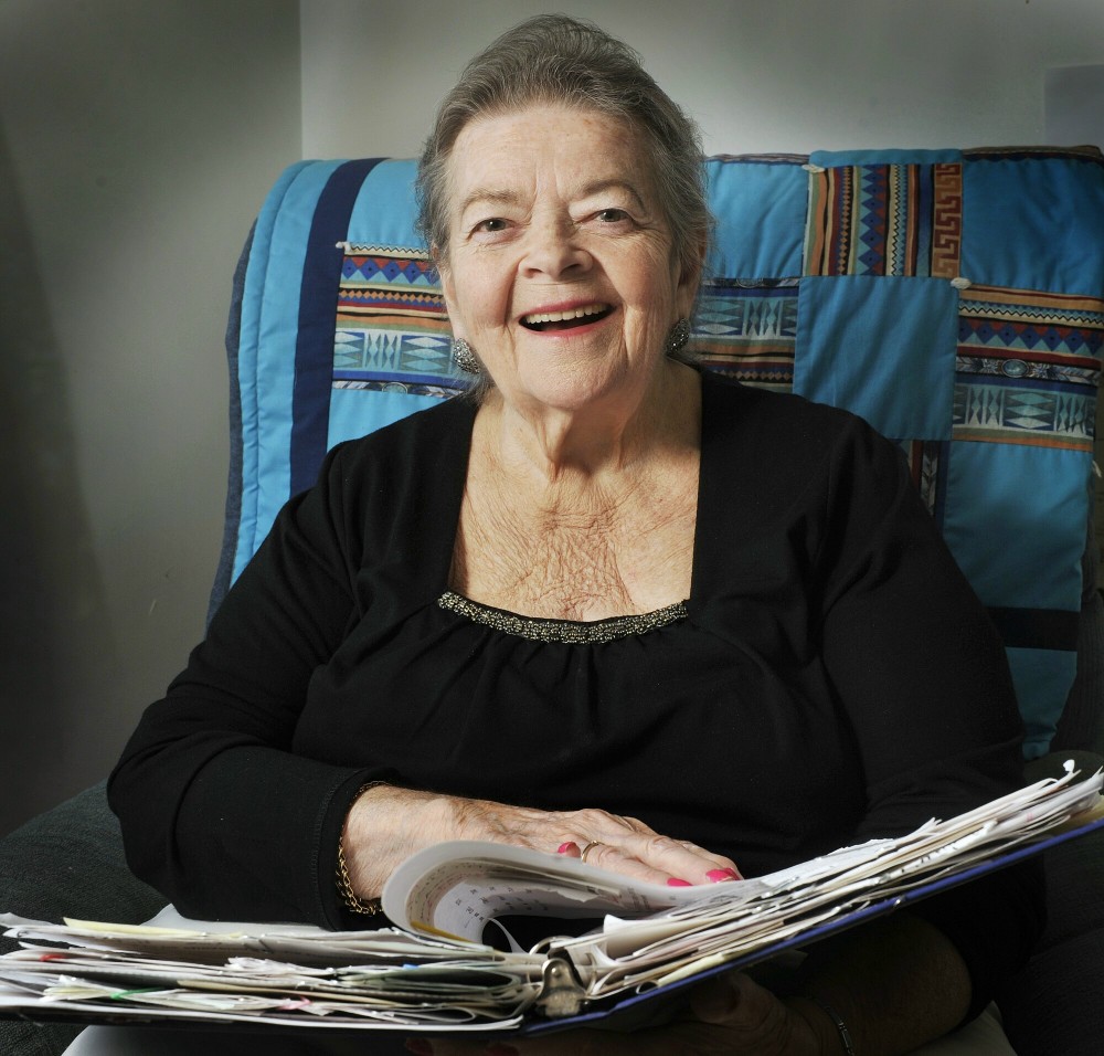 Monday, November 19, 2012. Joan Sheedy has started a program in which volunteers shovel porches, sidewalks, and steps of elderly people. Sheedy keeps track of her 156 clients and the volunteers with her notebook and her home phone.