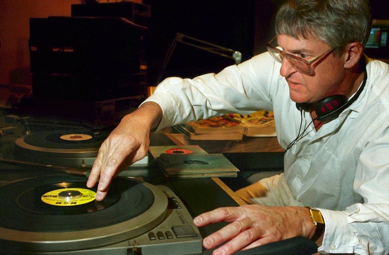 In this 1997 file photo, Toby LeBoutillier loads up a turn-table as he tries to find the right starting point for a song. Leboutillier who will host his final "Down Memory Lane" program on public radio on Friday, as MPBN Radio adjusts its schedule to accommodate more news, talk and issue-oriented programming. (AP Photo/Michael C. York)
