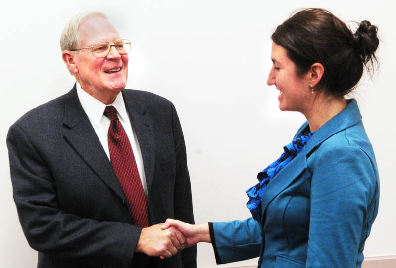 Republican Rep. Melvin Newendyke is congratulated by Democratic challenger Rachel Sukeforth after a recount reaffirmed him as the winner in House District 80 seat, representing Litchfield, Monmouth and Wales, on Wednesday morning in Augusta.