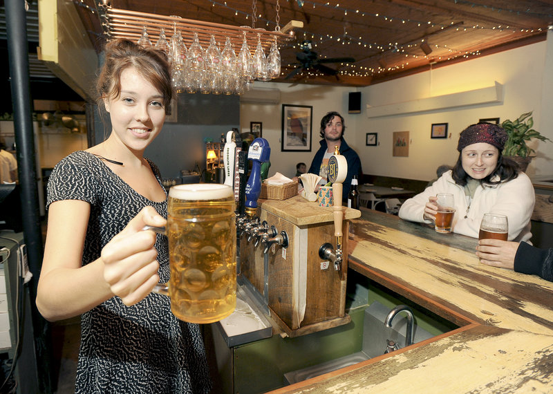 Reegan Brown pours a draft at Bonobo in Portland’s West End.