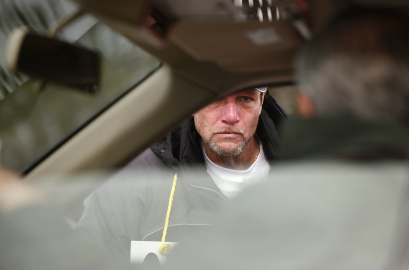 Joe Locey of Biddeford, a 13-year employee at the local Hostess plant, talks to a plant supervisor who was driving away from the site Friday. Hostess Brands Inc., which has opted to close its doors after 82 years following a decade of financial tumult, laid the blame on its bakery workers union, which went on strike Nov. 9.