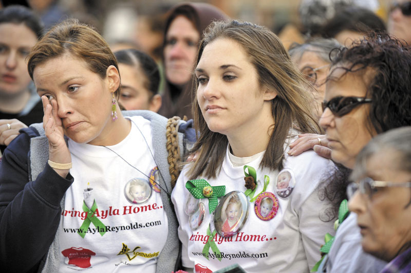 Trista Reynolds, center, at a rally in support of missing toddler Ayla Reynolds in Portland’s Monument Square earlier this year.