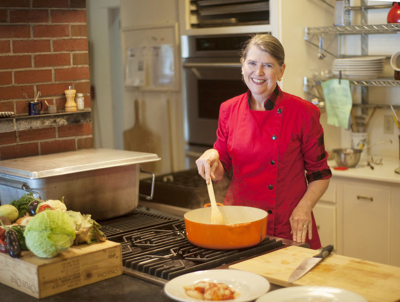 Cheryl Wixson works in the kitchen of her Bangor home to produce hand-crafted prepared foods, such as pasta sauce, applesauce, ketchup, relish, jam, etc., in small batches using all Maine ingredients.