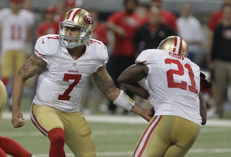 San Francisco 49ers quarterback Colin Kaepernick, left, hands off to running back Frank Gore during the second quarter of an NFL football game against the St. Louis Rams Sunday, Dec. 2, 2012, in St. Louis. (AP Photo/Seth Perlman) Edward Jones Dome