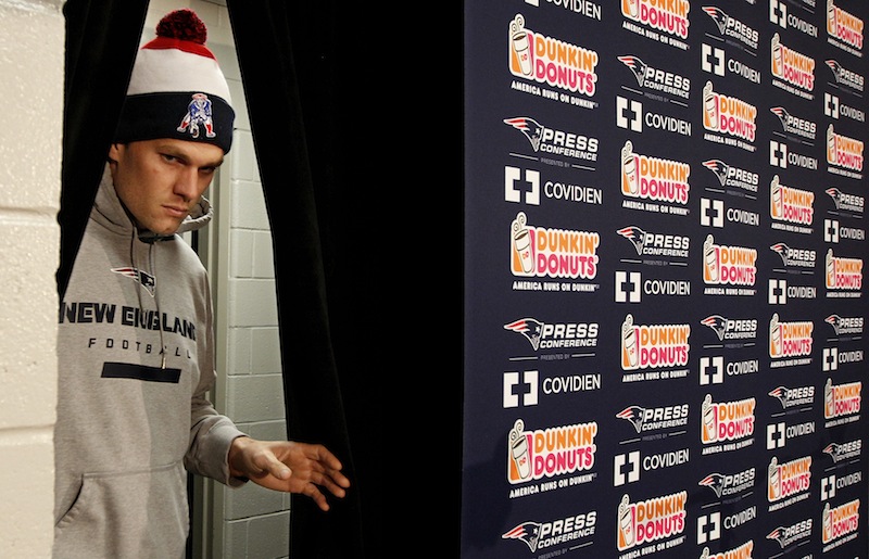 New England Patriots quarterback Tom Brady enters a media availability at the NFL football team's facility in Foxborough, Mass., Wednesday, Dec. 5, 2012. (AP Photo/Stephan Savoia) Gillette Stadium