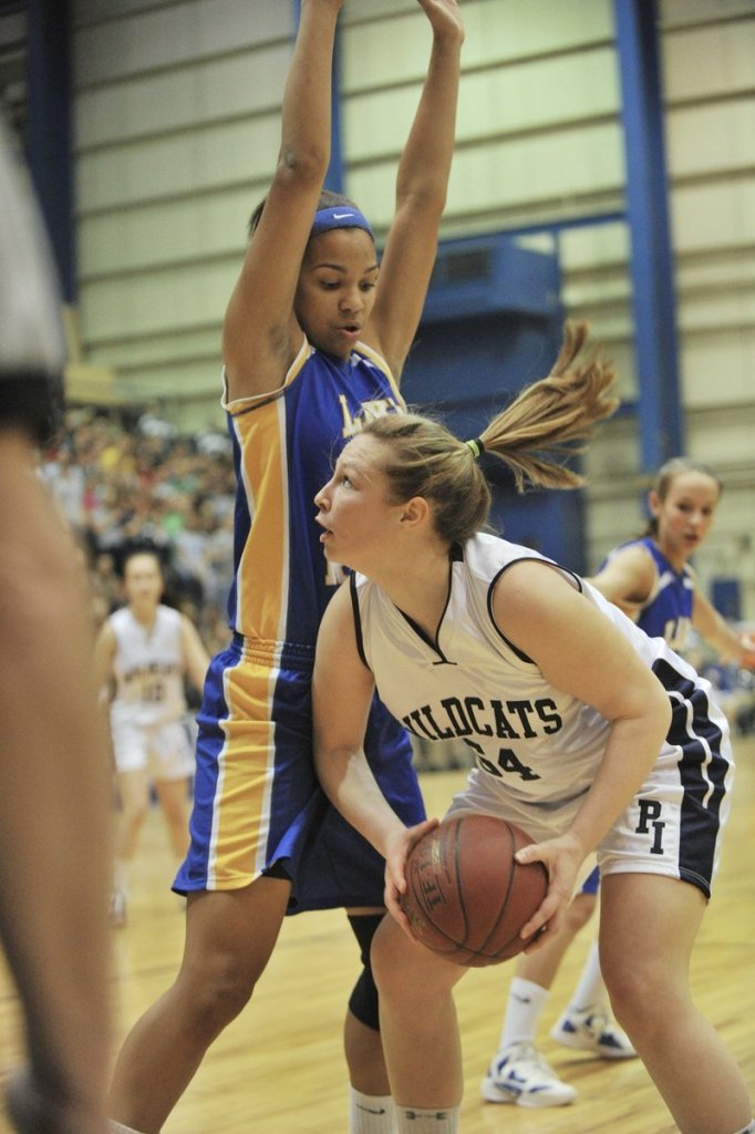 Tiana-Jo Carter, left, at 6-foot-2 is a strong defender as well as an offensive threat for Lake Region, the Western Class B champion.