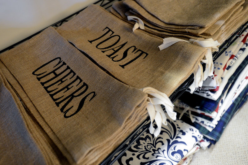 Burlap wine bags are new to Tiny Olive’s offerings this year. Ivy’s bags are more expensive than paper gift bags up front, ranging from $5.99 to $9.99 each, but she says they pay for themselves over time.