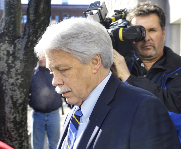 Mark Strong Sr. leaves Cumberland County Courthouse following a hearing on a motion by his defense attorney, Dan Lilley, on Jan. 18, 2013.