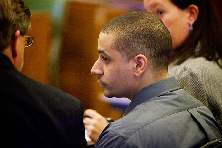 Pool Photo/Troy R. Bennett: Defendant Joel Hayden speaks with his lawyers before opening arguments in his double murder trial in Portland Monday Jan. 7, 2013. Hayden, of New Bedford, Mass., is accused in the shooting deaths of his girlfriend, Renee Sandora, 27, and his longtime friend, Trevor Mills, 28.